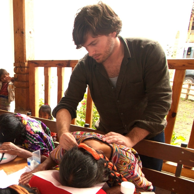 Dr. Caron treating a patient during a medical mission in Guatemala