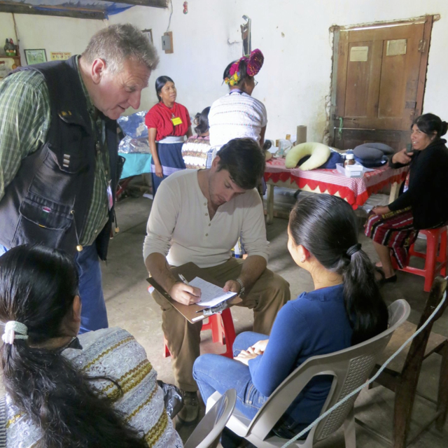 Dr. Peter Caron writing up a patient’s case
